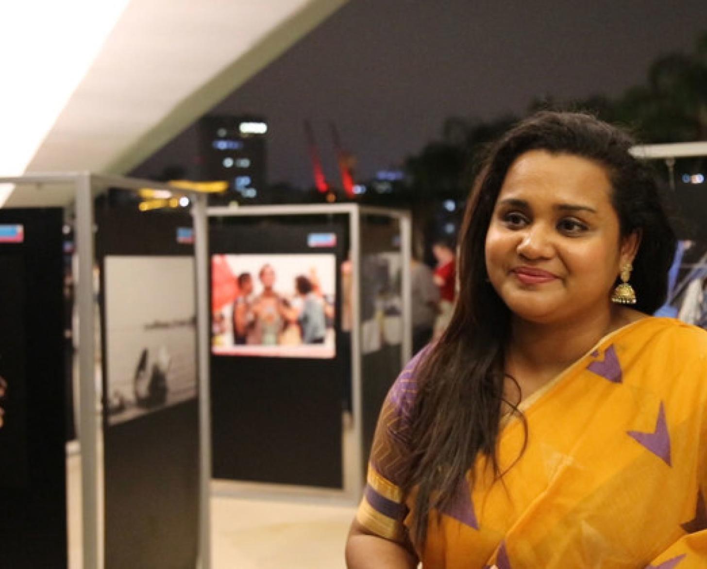 Jayathma Wickramanayake, the UN Secretary-General's Youth Envoy tours the exhibit.