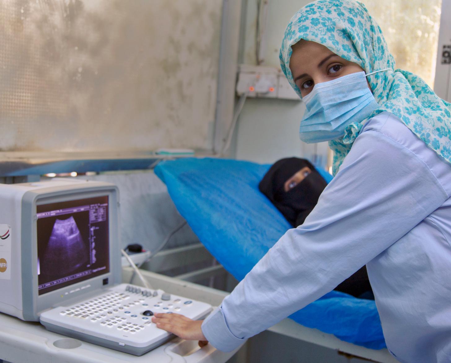 A woman receives reproductive healthcare at a WHO-UNFPA-supported Al Thawra hospital in Al Hodeida.