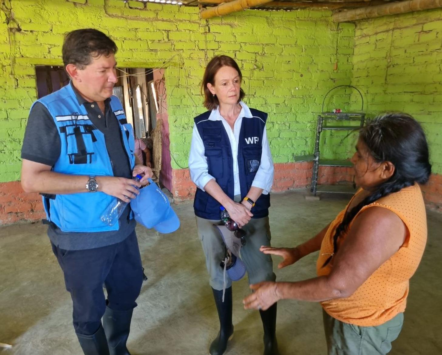 Peru Resident Coordinator Igor Garafulic and a representative from the World Food Program