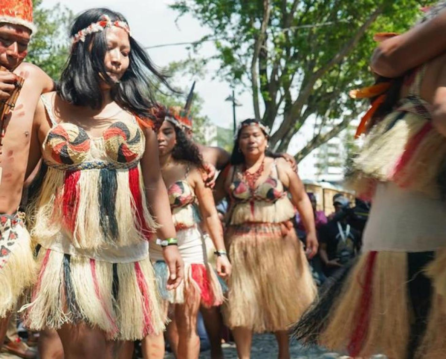 The Cubeo Indigenous people perform a dance at COP16.