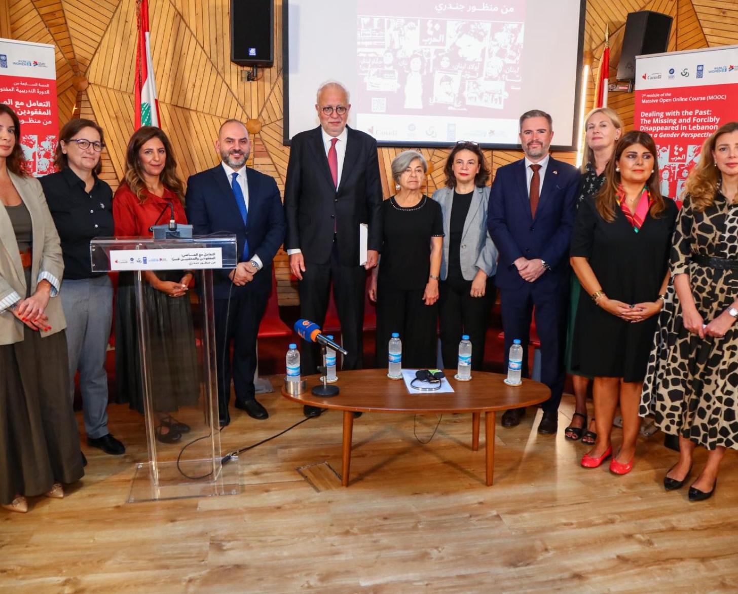 Eleven speakers attend a launch event for a Massive Open Online Course.